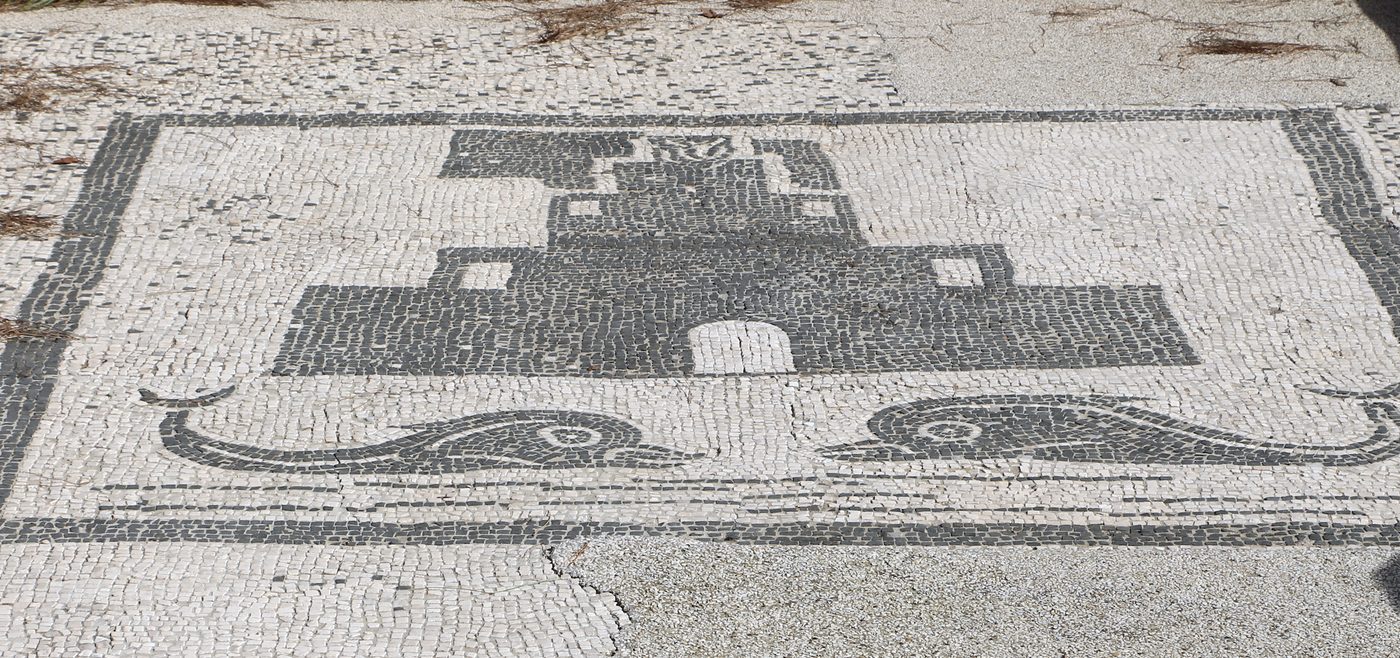 Black-and-white Roman floor mosaic showing the stepped lighthouse of Portus, Ostia Antica