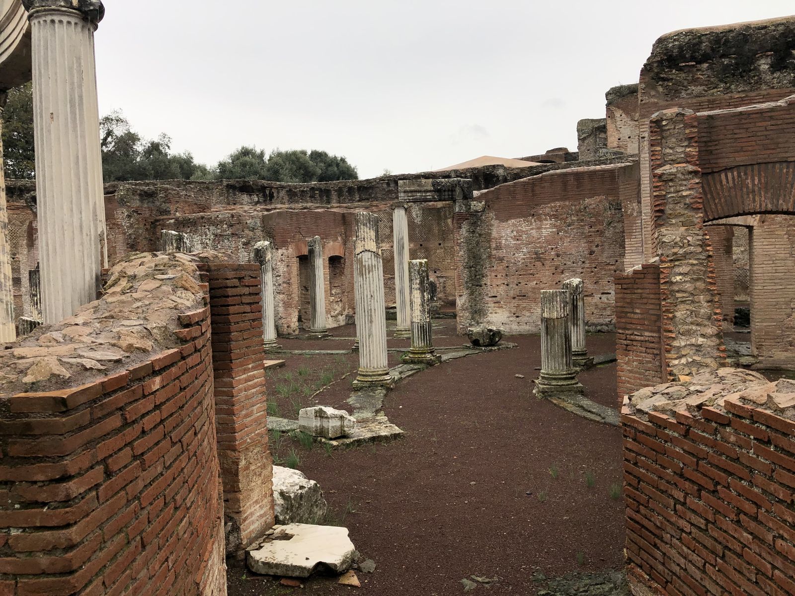 Standing among the surviving walls and column bases of the island villa at the Teatro Marittimo